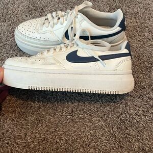 Nike White Platform Sneakers with Navy Swoosh
